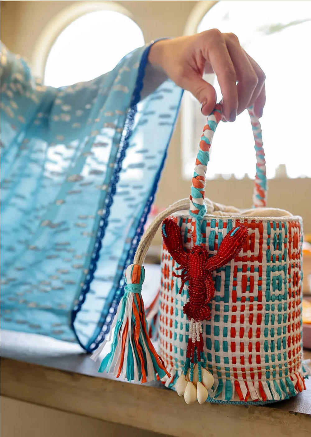 The Lobster Lattice Raffia Bucket Bag